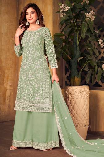 Green net sequins work semi stitched size up to 42 salwar suits