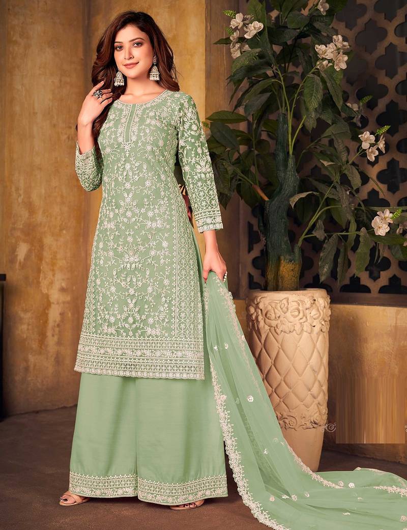 Green net sequins work semi stitched size up to 42 salwar suits