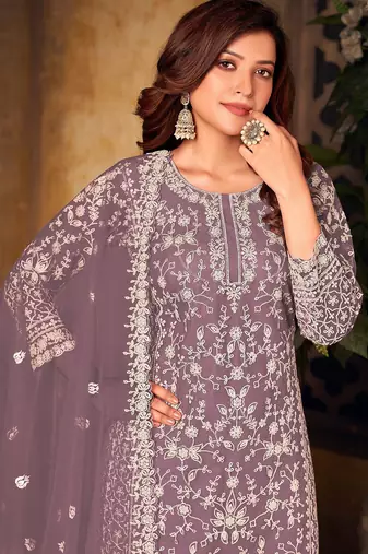 Mauve net sequins work semi stitched size up to 42 salwar suits