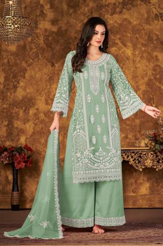 Green net hand embroidery semi stitched size up to 42 salwar suits