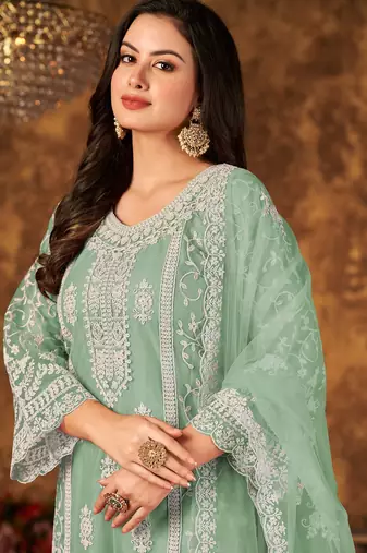 Green net hand embroidery semi stitched size up to 42 salwar suits