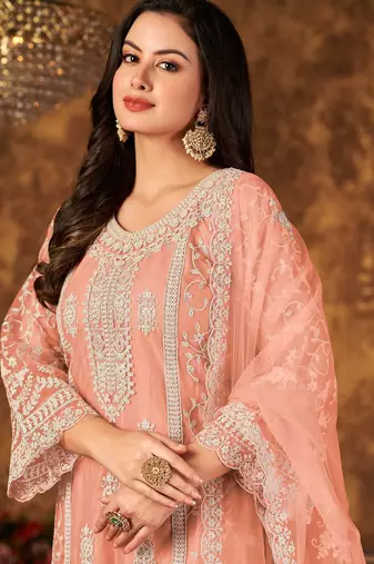 Peach net hand embroidery semi stitched size up to 42 salwar suits