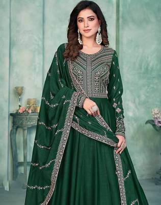 Green art silk hand embroidery semi stitched size up to 42 salwar suits 2