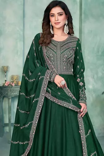 Green art silk hand embroidery semi stitched size up to 42 salwar suits