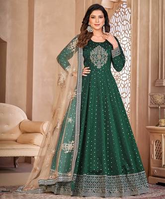 Green art silk sequins work semi stitched size up to 42 salwar suits 1