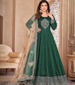 Green art silk sequins work semi stitched size up to 42 salwar suits