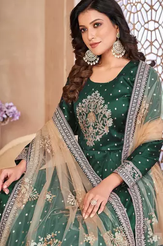Green art silk sequins work semi stitched size up to 42 salwar suits