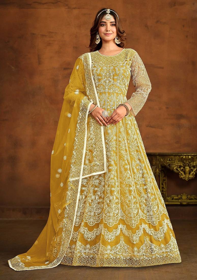 Yellow net thread work semi stitched size up to 42 salwar suits