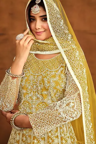 Yellow net thread work semi stitched size up to 42 salwar suits