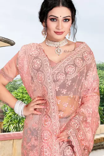 peach net saree with zari sequin work