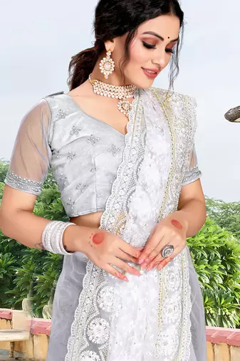 white net saree with sequin zari work