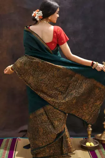 green pure silk saree with woven pattern