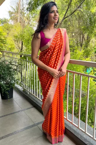 light orange silk saree with woven design