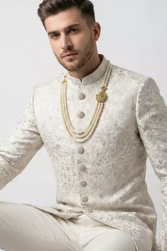 Ivory floral embroidered silk jacquard sherwani with mandarin collar for weddings and festive occasions