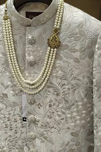Ivory floral embroidered silk jacquard sherwani with mandarin collar for weddings and festive occasions