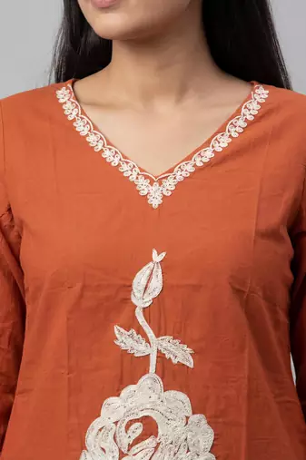 Women orange cotton printed kurta pant dupatta set with hand work and embroidered lace