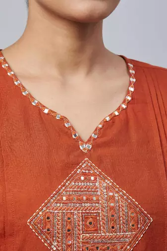 Women orange cotton printed kurta pant dupatta set with hand work and embroidered lace