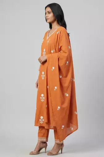 Women orange cotton printed kurta pant dupatta set with hand work and embroidered