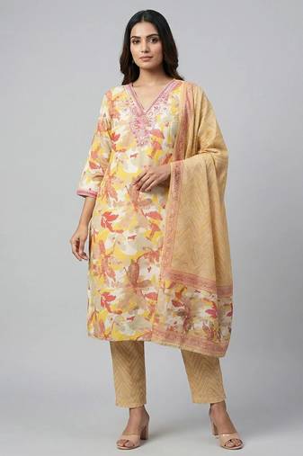 Women yellow cotton printed kurta pant dupatta set with hand work and embroidered lace