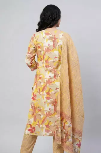 Women yellow cotton printed kurta pant dupatta set with hand work and embroidered lace