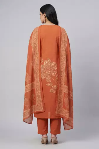 Women orange cotton printed kurta pant dupatta set with hand work