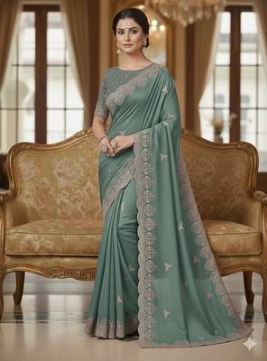 green georgette saree with sequin embroidery 1