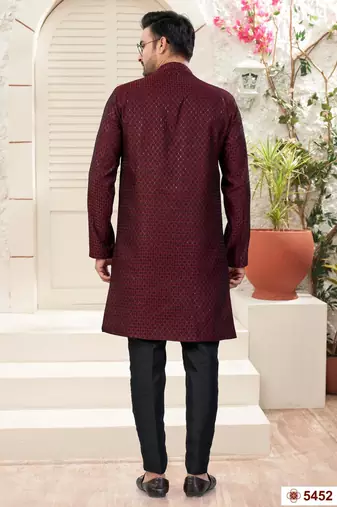 Maroon & blackhavy jacket style attached indowestern set with thred and stone work with fancy botton