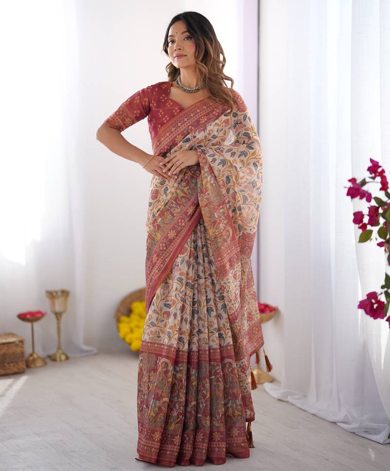 Handloom beige cotton saree with maroon blouse, pomegranate floral print & village tale pallu