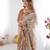 Elegant beige & brown pure linen cotton handloom saree with animal motifs and floral prints