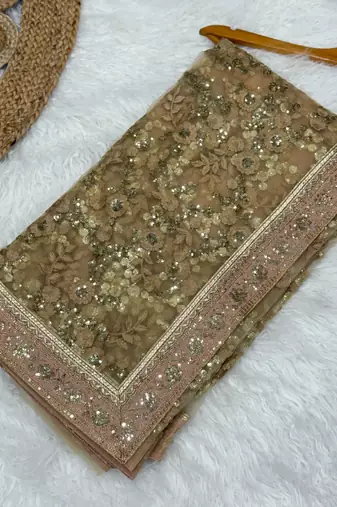 Beige color Fully Embroidered soft mono net Saree