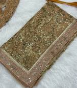 Beige color Fully Embroidered soft mono net Saree