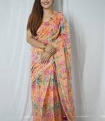 orange cotton saree with floral design