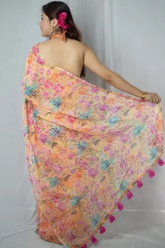 orange cotton saree with floral design