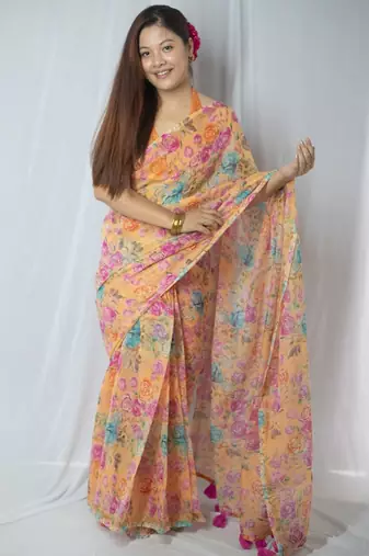 orange cotton saree with floral design