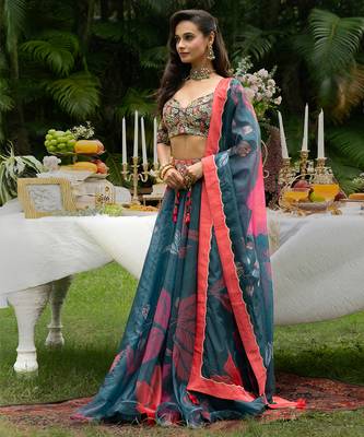 teal organza lehenga with printed floral designs 2