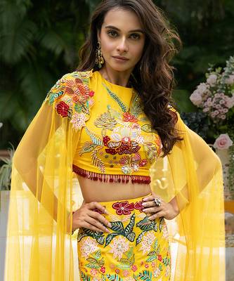 yellow viscose lehenga with embroidered floral designs 3