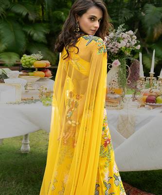 yellow viscose lehenga with embroidered floral designs 4