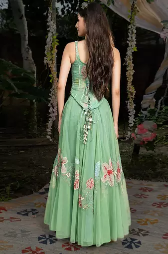 light green net lehenga with embroidered floral designs