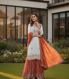 white & orange sharara suit
