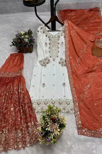 white & orange sharara suit