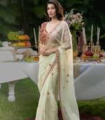 mint green organza saree with embroidered floral work