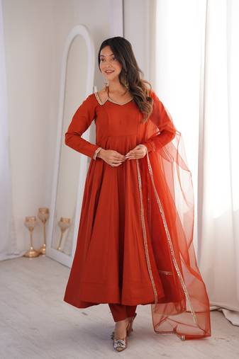 Women   s party wear rust anarkali dress with embroidered lace neck