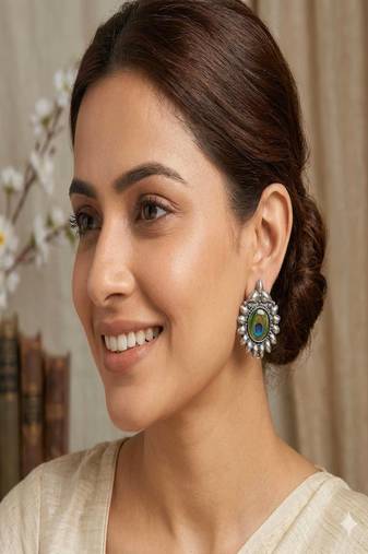 Oxidized peacock feather stud earrings: boho silver tone jewelry