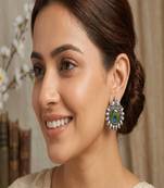 Oxidized peacock feather stud earrings: boho silver tone jewelry