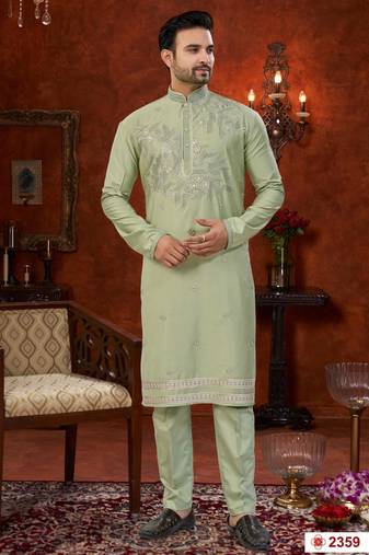 Pista green soft silk with zari work on neck & daman amrodery work with thred and less work kurta pajama set