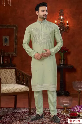Pista green soft silk with zari work on neck & daman amrodery work with thred and less work kurta pajama set