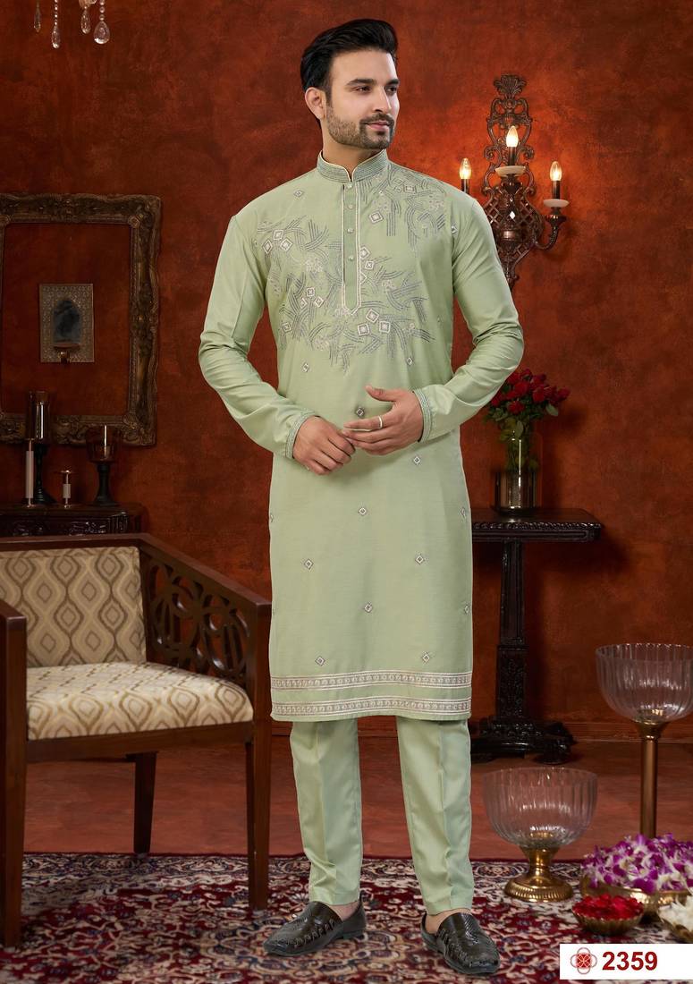 Pista green soft silk with zari work on neck & daman amrodery work with thred and less work kurta pajama set
