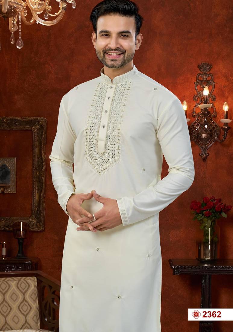 Cream soft silk with beads & mirror work on neck & daman amrodery work with thred and less work kurta pajama set