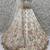 Delightful White Floral Embroidered Net Bridesmaid Lehenga Choli