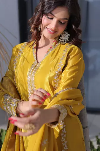 Splendid Mustard Yellow Zari Work Silk Haldi Wear Pant Suit With Dupatta